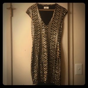 Small black and gold mini party dress